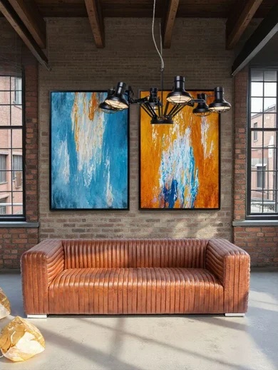 zu sehen ist eine braune KARE-Couch in einem Loft